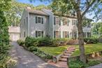 Welcome to this beautifully maintained Colonial-style home, ideally situated in the coveted Nassau Point communityâ€”one of the North Forkâ€™s most desirable bayfront neighborhoods. This majestic 4-bedroom, 3-bath residence offers timeless architecture with 9 foot ceilings on main and upper levels, thoughtful updates, and an elevated country lifestyle. The classic floor plan includes a formal living room with a wood-burning fireplace and a separate dining room, creating defined spaces for entertaining and everyday living. The spacious eat-in kitchen is a true chefâ€™s delightâ€”featuring a center island, its own fireplace, indoor BBQ, and premium appliances including KitchenAid, Sub-Zero, and Thermador tri-mode systems. Oak wood floors run throughout, adding warmth and character to every room. There are two staircases for access to the second floor bedrooms. The primary ensuite bedroom features a wood burning fireplace for cozy, warm Winter evenings. Step outside to your private backyard retreat with an oversized 46â€™x23â€™ Gunite inground pool surrounded by a cedar deckâ€”ideal for relaxing and hosting gatherings. Additional highlights include multiple heating and cooling zones with separate furnaces and compressors, a well system, a newer submersible pump, new storage tank, commercial-grade filtration system, and optional connection to town water. Located in the prestigious Nassau Point area, the home offers access to at least two private bay beachesâ€”perfect for swimming, or simply enjoying the peaceful shoreline. The full-height 8-foot ceiling unfinished basement presents great potential for future expansion or storage. Blending classic charm, modern comforts, and an exceptional location, this is a rare opportunity to own a distinguished home in one of the North Forkâ€™s most exclusive bayfront enclaves. Sale includes a 10, 000 watt generator that handles most of the utilities.
