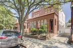 Welcome to this charming semi-detached brick home in the heart of East Elmhurst! The main level features a spacious living room, a formal dining room, a bright eat-in kitchen, and a convenient half bath. From the kitchen, enjoy easy access to the backyard-perfect for outdoor gatherings. Upstairs, youâ€™ll find three comfortable bedrooms, a full bath, and a hallway skylight that fills the space with natural light. The finished basement offers a cozy family room, ample storage, a boiler room, laundry area, full bath, and a separate entrance with direct access to the backyard. Ideally located near Astoria Boulevard and Northern Boulevard, this home is just minutes from the 7 train, only 20 minutes to Manhattan, and close to shopping, dining, and so much more!