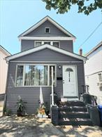When opportunity knocks to live in South Ozone Park, open the door to this great home! Sunny and bright, Open Concept Home with gleaming hard-wood floors, Fully Renovated in 2022 , this Colonial home includes a charming Living Room and Dining Room, Kitchen with Stainless Steel Appliances and quarts Countertop. Three Bedrooms with a walk up attic with 2.5 bathrooms and Fully finished basement with separate entrance. Walking distance to shopping & transportation.