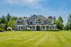 Shingle style home with horse barn, paddocks & riding arena, set on over 9 acres with a gorgeous westerly view of Roxbury&rsquo;s bucolic rolling hills! Separate 2.05 acre building lot will convey with this property. You can build another house, outbuildings, or whatever zoning will permit! This property is an equestrian&rsquo;s dream. Horse barn w 5 stalls w waterers. 2nd level in barn loft for additional space. 6 horse paddocks w waterers & electric fence. Perfectly set riding arena w views. Built in 2013, no expense was spared on the construction of this home. Sprawling kitchen w marble countertops, stainless appliances, butler&rsquo;s pantry & breakfast nook opens to a sun-drenched 2-story great room w views. Tastefully done formal living & dining rooms. Dining room w trey ceilings & wood paneling. Charming office w bookshelves & built-ins. Cozy, multi-purpose den w fireplace & french doors. Mudroom & powder room. Upstairs, master suite w bookshelves, built-ins, sitting area, walk-in closet w center island & stunning master bath w heated marble floors, marble countertops, double vanities, stand-up shower & jetted tub. 3 additional bedrooms all amply sized w walk-in closets & attached baths. Oversized rec room currently used as a home gym & play area. Additional room on 3rd floor. This home is set on several cleared acres but is secluded from all neighboring properties and backs up to 34 acres of open space. Plenty of room for a pool. Taxes reflect PA490 tax exemption for 5.22 acres.The westerly views of rolling hills offer stunning sunsets from bluestone patios. The setting and land are serene and surreal!