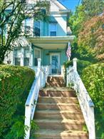 This single-family home, situated in the Village of Haverstraw, spans 1858 square feet and features 3 bedrooms and 2.0 bathrooms. The property&rsquo;s convenient location provides easy access to the Public Library, Hudson River, Marina, Bowline Park, restaurants, New York Waterways commuter ferry, and commuter bus to Manhattan. A notable feature is the full walk-up attic, which offers potential for an office nook or additional bathroom space, including a possible full ensuite. The expansive yard provides ample space for entertaining and gardening, with a full side yard offering opportunities for expansion, including a garage and private drive. The property has undergone recent upgrades, including a new road to the home waterline, updated electrical infrastructure, and the installation of new appliances, comprising a washer, dryer, stove, and refrigerator. This property presents a unique opportunity, with considerable potential for renovation and expansion.