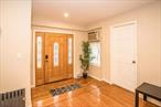 Welcome to this stunning one-family home in the vibrant neighborhood of Flushing! This spacious residence features 4 comfortable bedrooms and 3 full bathrooms, perfect for families of all sizes. The bright and airy layout includes a welcoming living room, a modern kitchen with ample counter space, and a cozy dining area. The home boasts a full finished basement, offering additional living space or a versatile entertainment area. Step outside to enjoy the private backyard with a large deck, perfect for outdoor gatherings and relaxation. The property also features a private driveway, providing convenient parking. Located close to schools, parks, shopping, and public transportation, this home offers both comfort and convenience.