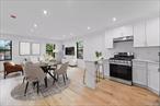 Space, style & modern luxury come together at 218-37 Spencer Avenue! A meticulously renovated 3 story single townhouse tucked away on a quiet, tree lined street of the Queens Village/ Hollis Hills border line. Sitting on a 40x100 lot featuring a wide private driveway, indoor garage and tons of space to enjoy outdoor gatherings. This charming single family will captivate you from the moment you arrive with its warm & welcoming energy. The indoor garage has access to the high ceiling walk in full finished basement, which has a designated laundry room, mechanical room and storage space and a full bath.The parlor floor of the owners duplex features an expansive sun drenched, modern open concept living/dining area which provides great space for entertaining. Beautiful chefs granite kitchen equipped with floor to ceiling custom cabinetry, island for bar stool seating and boast a full fleet of stainless steel appliances. 1/2 bath on first floor for your guest. Tucked away in the rear of the first floor the elegant primary suite awaits you, adorned with a private en suite with spa-like finishes and a walk in closet. Up a flight of stairs onto the second floor 3 additional spacious bedrooms awaits you, each equipped with ample closet space. Down the hall a fully tiled bathroom is adorned with state of the art wall & floor tiles and shared between the additional bedrooms. Renovations include brand new select wide oak wood flooring, recessed lighting, central A/C, brand new electrical, heating and plumbing systems throughout. This masterfully re-imagined single family is conveniently located with close proximity to major transportation which makes commuting a breeze. Short blocks to Braddock Avenue, Hillside Avenue, Grand Central Parkway, Springfield Blvd. Short blocks to schools, shopping centers, restaurants, cafes, parks and many other vibrant neighborhood amenities.