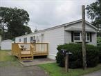 Located in Riverhaven which is a 55+ community is this spacious 14x70 980 sq ft manufactured home constructed in 1985. The home features 2 bedrooms, a large kitchen, a spacious living room, a large bath with double sinks, tub/shower, laundry area 10x12 deck, cement patio, and 8x12 shed. Land rent is $1153/month and includes taxes, water, trash removal, sewer maintenance, and road maintenance. Park management requires a 630 or better credit score and a monthly income of at least twice the park rent.