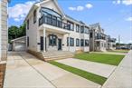 Step into luxury living with this stunning, newly built 2-story brick home that perfectly balances modern elegance and everyday comfort. Located just moments from the A train and Resort World Casino, this home offers unbeatable convenience alongside style. Designed with thoughtful details, it features in-unit laundry on both floors, making it ideal for multi-generational living or added everyday ease. The expansive open concept kitchen flows seamlessly into the dining and living areas, creating a perfect space for entertaining or relaxing. Enjoy energy efficiency with solar panels, along with central air conditioning and heating for year-round comfort. The massive cellar or basement offers endless potential, whether used as a gym, media room, or creative space. A private driveway and garage ensure stress-free parking. With easy access to buses, trains, and major highways, commuting is a breeze. Seller options are also being provided, making this an exceptional opportunity you won&rsquo;t want to miss.