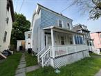 This newly converted three family with an unfinished third floor to be sold with fully approved site plans ready to finish this large property on the south side of Poughkeepsie! The property has been fully gutted with plumbing, HVAC, and electric roughed on the 1st and 2nd floors. These two floors will house 2 beds/1 bath each with brand new kitchens & bathrooms, new heat pumps servicing electric heat and air while boasting 1, 000+ sq ft. each. The basement studio will be roughly -400 square feet with one bath. There will be common laundry and storage in the basement as well. The plans come with 4 off street parking spaces to be built. This will be a great income producing asset with low expenses as all utilities will be separately metered!