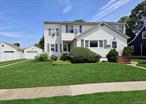 Welcome to this exceptional and versatile home, perfectly situated on an oversized lot in the heart of Merrick. Just minutes from shopping, restaurants, parks, the Long Island Rail Road, and a quick commute to NYC, this property offers both space and convenience.Featuring 5 generously sized bedrooms and 2 full bathrooms, this home provides the perfect layout for comfortable living and entertaining. With a possible mother-daughter setup (with proper permits), and a full finished basement with a separate outside entrance, thereâ€™s plenty of flexibility for extended family, guests, or home office needs.The extra-large lot gives you room to expand, garden, or simply enjoy a more private outdoor space â€” a rare find in this sought-after neighborhood.Additional highlights include a newer boiler, newer roof, owned and fully paid-off solar panels, and a quiet residential block with a strong sense of community. Donâ€™t miss this opportunity to own a spacious, energy-efficient home with incredible potential, both inside and out. Schedule your private tour today!