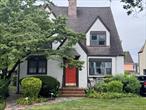 This beautiful Tudor Style property is register as a Historical Landmark, it set on a 5, 000 square foot tree line lot, located in beautiful Addisleigh Park. This home feature 2, 558 square feet of living space that consist of two and half floors. There is a front entrance foyer, with first floor half - bath, the interior area has hardwood floors throughout the house, and an immaculate living room that includes a wood burning fireplace, and plenty of natural lighting. There is a formal dining room that connects to both the walk-through kitchen and the family room, which allows access to the backyard. The kitchen is equipped with stainless steel appliances and loads of cabinets. The second floor has three bedrooms, and a full bathroom, with tub and stand-up shower. The second level allows us to gain access to the third floor that has a bedroom, full bathroom and extra storage space. There is a full finished basement with separate entrance, laundry and utility room. The backyard has a patio deck connected to the back porch, and lounge area set under backyard trees, and is enclosed with a privacy fenced that&rsquo;s secures the entire back of the house. The paved driveway that leads to a two-car garage, with a separate side door entry. This community gives access public transportation, minutes from the Long Island Railroad, Jamaica Transportation Center, MTA buses and plenty of eateries.