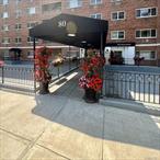 Looking for a blend of quiet, location, restaurants, shopping, Fitness facilities, close to train, transportation and major Highways? Look no more, this sun filled end unit offers two generously sized bedrooms, hardwood floors throughout, full bath, a spacious bright living room with expansive window overlooking the gorgeous grounds, an updated kitchen with granite counter and glass tile backsplash with access to the sun filled dining room. Laundry is on each floor! The building is going through so many upgrades, mailing room, receiving room, lobby, bike rack storage etc. This is a gem you do not want to miss !!!