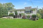 Welcome to 15 Augur Road in Airmont â€“ A Special Place to Call Home!This beautifully maintained 4-bedroom residence has been lovingly updated and offers the perfect blend of comfort, space, and convenience. Ideally located just five minutes from the NYS Thruway and major commuter routes, this home sits on a stunning, level 2/3 plus-acre lotâ€”private, expansive, and ideal for entertaining, recreation, or relaxing in your own backyard oasis.The exterior features maintenance-free vinyl siding with classic brick accents, enhancing the home&rsquo;s curb appeal. Step inside to find a bright and airy interior filled with natural light. The updated white kitchen is both stylish and functional, featuring granite countertops, skylights, clean lines, and a center islandâ€”perfect for everyday living and entertaining.Enjoy hosting in the large formal dining room or unwind in the sun-filled three-season room that overlooks the spectacular backyard. The open floor plan flows effortlessly into the spacious living room, complete with an oversized picture window and recessed lighting.Upstairs, youâ€™ll find three generously sized bedrooms, including a primary suite with a tastefully updated en suite bath. Hardwood floors lie beneath the carpeting, ready to be revealed. The lower level offers even more living space with a huge recreation/family room and a fourth bedroomâ€”perfect for guests, a home office, or both.Additional highlights include a large two-car garage and plenty of storage throughout.Donâ€™t miss your chance to own this exceptional home in one of Airmont/ Suffern&rsquo;s area most desirable neighborhoodsâ€”schedule your private showing today!