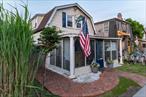 Welcome to The Big Fish, a classic Ocean Beach home. Fully renovated in 2024, this home features all-new appliances, updated electrical wiring, new subfloor and finish flooring throughout the main living areas, and a brand-new roof over the porch and rear extension. Structural upgrades include new posts and stringers, ensuring peace of mind for years to come.The bright, freshly painted interior is fully insulated on both floors for comfort. The main level offers a spacious screened-in porch with a sitting area, a cozy living room with an electric fireplace, a dining room, a renovated kitchen, a full bathroom, and a king-sized bedroom. Upstairs you&rsquo;ll find three additional bedrooms and a half bath. Centrally located in the heart of Ocean Beach, The Big Fish puts you just steps away from local dining, shops, and the beach. Whether you&rsquo;re looking for a peaceful retreat or a fun-filled summer home, this beautifully updated property is move-in ready and waiting to make your beachside memories unforgettable.