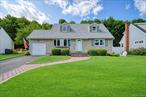 Welcome to this beautiful, updated home in one of the most desirable sections of East Norwich. Large expanded cape filled with natural light. This home features a formal living room and dining room, an open and updated eat in kitchen and a large step down den with cathedral ceilings and fireplace. There is an enclosed patio that offers views of the yard and is a great place to enjoy all four seasons through the walls of windows. There is great flow for entertaining.  There is a first floor primary bedroom and a full bath. The second floor has three spacious bedrooms and another full bath. Beautiful yard with outdoor kitchen and hot tub. Convenient to shops, restaurants and schools.  Meticulously maintained. This house is a must see!