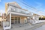 PRIVATE BEACH ACCESS & FEMA-COMPLIANT (ELEVATED) HOME! This immaculate 2-bedroom plus office residence is the perfect blend of luxury, comfort, and practicality, ready for its next discerning owner. Located in a private beach community and lifted above FEMA flood requirements, this home offers peace of mind and upscale amenities throughout. Step inside to find real hardwood floors, bathroom has heated floors, a spacious open layout, and a chefâ€™s kitchen featuring a Bosch dishwasher, GE Profile refrigerator and freezer, microwave, and convection oven vented to the outside.The spa-like bathroom is a true retreat, tub, walk in shower, dual sinks, heated floor in bathrom. The master bedroom features hardwood floors, while the additional bedroom and office offer flexibility for guests or remote work. Modern conveniences abound with a Navien hot water on-demand system and heating system, Electrolux washer and dryer, updated electrical panel, and even an EV charger in the pristine 2-car garage. Newly updated heating and AC system. Whole House Generator for your convenience. This home is truly in MINT conditionâ€”donâ€™t miss your chance to live the beach lifestyle with elevated comfort and elegance!