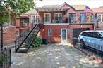 Brick two family home. 22x 46 building size. Great residential location. 3 Bedrooms over a one-bedroom unit. Private parking and back yard. Close to shopping, park, and schools. Move in condition.