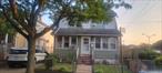Bright and sunny, large three bedroom Colonial with2 and 1/2 baths. Features include wood floors, beautiful , stained glass window, den, partially finished basement with laundry area, half bath and outside entrance; partially finished attic with walk-up steps, two car garage with driveway apron that can accommodate 5 cars, oversized lot and so much more!!! Close to ground transportation, major highways, easy shopping and excellent restaurants. In School District #29