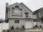 Long Beach: walk in- 1st floor 3 Bedroom, 2 Bathrooms, Living Room/Dining Area/Kitchen, Deck, Driveway. 1 Month Security Deposit. utilities not included, No pets.