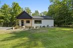 Welcome to this fully renovated country ranch nestled in the scenic Hudson Valley! This charming 3-bedroom, 2-bathroom home offers 1, 400 square feet of thoughtfully designed living space that perfectly balances warm and neutral tones with modern attributes. Enter through the covered rocking chair front porch into a mudroom offering plenty of space with a coat closet, and storage for other outdoor gear. Move into the living room that is anchored by a large picture window and plenty of open space to entertain or enjoy the pure relaxation of country living. The thoughtfully designed kitchen comes complete with stainless steel Frigidaire Gallery appliances, a wine cooler, and plenty of counter and cabinet space. Flowing through the kitchen, feel a warm welcome into the dining room that bathes in natural light throughout the day overlooking the back yard and deck. The primary suite hosts a peaceful feel with double closets and an on-suite bathroom offering warm-toned tile work and a walk-in shower. Two additional bedrooms and a full bath make a great office space, or room for additional guests. Donâ€™t miss the main level laundry room that keeps household tasks organized and out of sight with shelving and cabinetry. The outdoor space truly shines with a generous back deck perfect for morning coffee or evening gatherings. The expansive backyard with a seasonal, peek-a-boo view of High Point Mountain provides endless possibilities for gardening, expansion, or simply enjoying the tranquility of country living.Location advantages abound with nearby attractions including the pristine Ashokan Reservoir for outdoor recreation, INNESS resort for sophisticated dining, spa days and golf. Tetta&rsquo;s Market is a stone throw away for any last-minute daily needs, and Vernooy Falls trail system for hiking enthusiasts. Whether you&rsquo;re seeking a primary residence or weekend retreat, this home delivers comfort, style, and the natural beauty that makes the Hudson Valley so desirable.