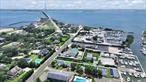 Fantastic Opportunity to own a Fully-Operational 1.14-acre Marina Property located on a prime waterfront site with access to Shinnecock Bay! The facility includes 28 boat slips with deep-water access, a fully-rented office with an attached garage, a separate garage/shop as well as an additional 4-Bedroom, 2-Bath Residence with its own garage, providing another source of steady income. Tenants currently occupying the home on a month-to-month rental basis. The property boasts a generously sized yard with room for a pool, additional parking or winter storage. The Marina features 320 feet of new plastic bulk-heading, ensuring extra-durability and low maintenance. The floating decking is only 10 years old, also constructed of durable plastic. The Marina offers strong boating appeal, and presents compelling opportunities for commercial marina operators, a waterfront hospitality expansion, or marine-related enterprises. The location is near to all the fabulous waterfront restaurants and establishments that Hampton Bays is renowned for, and allows for easy access to Shinnecock Bay and the great Atlantic Ocean! Ideally positioned for an owner/operator to reside where they work. Dream Big and Bold and turn this Marine opportunity into something spectacular!!