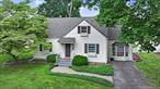 Nestled in the iconic Lacey Field neighborhood in the Town of New Windsor, is this 1940&rsquo;s Cape Cod blending original character with thoughtful updates. Shutters and window boxes adorn this 3 Bed 2 Bath home offering classic design, cozy spaces, and a warm, welcoming feel throughout creating the perfect balance of vintage appeal and modern convenience. Inside you&rsquo;ll find original hardwood floors, moldings, wood doors, hardware, pocket doors, and built-in corner cabinet in the Kitchen which reflect the home&rsquo;s rich history. The bright and inviting living room features a cathedral ceiling with beams and bay window, Kitchen with an abundance of cabinets and granite counter, formal Dining Room, 3 bedrooms in all ,  1 main level Bedroom and 1 full updated Bath with stylish pedestal sink and conveniently located laundry closet with washer and dryer. Upstairs 2 charming dormered Bedrooms and full updated Bath. The lower level offers a partially finished basement with 382 Sq. ft of finished storage space and plenty of unfinished storage /utility space. Step outside to a lovely spacious screen porch overlooking a private fenced backyard in a park like setting with perennial gardens and mature trees, patio and shed - perfect for relaxing, gardening, or enjoying the outdoors. All municipal services including water, sewer and natural gas utilities. Prime neighborhood and location for commuters - Metro North Beacon Station 20 minutes - Rt 9w to West Point or Rt. 32 to Woodbury Commons 20 minutes.