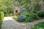 Welcome to Fieldston Gardens, 525 West 238th Street, Apt. 1L, a charming slice of history nestled in the heart of Riverdale. This pre-war gem, constructed in 1926, offers a blend of vintage charm and modern convenience, with an abundance of natural light and an array of features to enhance your living experience. This pet-friendly, 100% owner-occupied cooperative is a haven for those who value a sense of community and outdoor space. Revel in the beauty of the lush grounds, adorned with mature plantings, and enjoy the added benefit of a community garden, perfect for those with a green thumb or those simply seeking a tranquil space. Step inside this spacious, first-floor foyer to discover an extra-large one-bedroom layout. The modern kitchen is a sight to behold with its windowed design, stainless appliances, and custom shelves and pot rack. The formal dining room, versatile in its use, can be easily converted into a second bedroom if desired. The living room, bathed in natural light, is the perfect space for relaxation, while the bedroom, complete with a California closet and decorative fireplace, offers a private retreat. The windowed bathroom is tastefully designed with subway tile and a soaking tub, offering a spa-like experience at home.Original hardwood floors, high ceilings with crown moldings, cedar closets, working dumb waiter and original style light fixtures add to the home&rsquo;s character, while upgraded electric and new windows provide modern convenience. The unit also comes with additional storage space and bike storage, plus a laundry room in the basement. Building will allow installation of in unit washer/dryer if desired.This property is not just a home, but a lifestyle. With a live-in super and porter on staff, your needs are well catered for. This central Riverdale location places you close to an array of shopping and dining options, with many modes of transportation easily accessible, including an express bus to NYC, a local bus to the subway, and a shuttle to Metro North. Experience the charm of yesteryears with the conveniences of today at 525 West 238th Street, Apt. 1L. A home where every detail has been thoughtfully considered, crafted to create a living experience that stands the test of time. Some photos virtually staged.