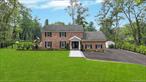 This Luxury Center Hall Colonial sits on .79 acres of meticulously landscaped grounds in the highly sought-after Strathmore section, within the award-winning Half Hollow Hills School District. Offering space, elegance, and functionality in every detail, this Valbrook Colonial is more than just a home, itâ€™s a lifestyle.A large expanded driveway leads to a grand front porch with double door entry, setting the tone for the sophistication within. The welcoming entry foyer features double coat closets and an updated powder room, while gleaming floors and recessed lighting flow seamlessly throughout the home. The oversized living room and formal dining room provide the perfect space for entertaining guests.At the heart of the home is a pristine, three-year-young white kitchen, boasting quartz countertops, stainless steel appliances, cabinet lighting, pot filler, walk-in pantry, six-burner gas oven, and a center island with barstool seating. The cozy family room, complete with a brick fireplace and sliding glass doors, opens to the expansive backyard for effortless indoor-outdoor living.Downstairs, the lower level includes a versatile playroom with durable vinyl flooring and access to the garage. The serene primary suite offers a walk-in closet and a luxurious two-year-young bathroom featuring radiant heated floors, a double vanity, custom tilework, and glass shower doors. Four additional generously sized bedrooms and two full bathrooms provide comfort and space for the entire family.A private office with sliding glass doors leading to the driveway and Bose speakers offers the perfect work-from-home solution with privacy and natural light.The home is equipped with energy-efficient solar panels, gas heating, and central air conditioning, ensuring year-round comfort and long-term savings. Public sewers and underground electric. The backyard is a true outdoor oasis, featuring a large paver patio, a paver walkway to the driveway, black aluminum fencing, and a huge in-ground heated swimming pool surrounded by pavers and enclosed with its own black aluminum fencing. A custom outdoor bar with barstool seating, Bose speakers and a 16-zone sprinkler system complete this resort-like setting.As part of the Strathmore community, enjoy exclusive club privileges including a community center, swimming pools, fitness center, tennis courts, pickleball, basketball, and year-round social activities. This exceptional home combines high-end finishes, modern comfort, and access to premier amenitiesâ€”all in one of Long Islandâ€™s most desirable neighborhoods.