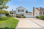 Welcome Home to a stunning Split level with, Paid in Full, Solar panels, top of the line 3 yo Heat and on demand hot water system (Gas) plus Central Air. Amazing fenced in yard with semi-inground pool, 8x10 shed, Patio and shaded Deck with retractable awning. Inside on the ceramic tiled first floor is the Living Room, updated Kitchen with Stainless Steel appliances, Granite countertops and, seating for 6 at the Dinning Room table. It also boasts a bay window into the yard and glass sliding doors to the rear deck. The top floor has 3 bedrooms (1 King Size, 1 Twin, 1 Queen) currently carpeted but does have hardwood floors under them. Each bedroom boasts custom closet organizers. Master bedroom has 2 closet. Both full bathrooms have heated floors. 1 Bathroom is on the top floor with the bedrooms and large linen closet next to it. Ground level boasts a large family room with gas fireplace, door access to the back yard, garage with 2nd refrigerator, and 2nd full bath. The basement recently finished with utilities and laundry room and its own Hv/Av unit.