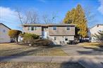 Welcome to this well-kept 5-bedroom home, in one of Spring Valleyâ€™s top locationsâ€”rarely available and highly sought-after!The main level includes a bright living and dining area, an eat-in kitchen with access to a large deck, a primary suite with a private bath, and two additional spacious bedrooms along with a full bath.Downstairs features a family/playroom, fourth bedroom, half bath, and laundry area. A private side entrance opens to an additional living space with a fifth bedroom, modern kitchenette, dining area, and full bath â€” ideal for extended family or guests.Enjoy a spacious, flat backyard perfect for relaxing or entertaining. A rare find with space for everyone!