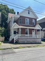 Great opportunity to own a two-family home in a prime location-perfect for an owner-occupant or investor. Both units offer spacious kitchens , comfortable living rooms, and 3 or 4 generously sized bedrooms. New bath room on each unit. two 100-amp breaker boxes,  long driveway with one car garage and separate utilities for each unit. This home offers-live in one unit and rent out the other, or add it to your investment portfolio.