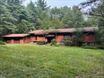 Contractors Dream - This huge home is in need of repairs being sold As Is - Great Bones - Great location with Easy access to Route 17 yet private. There is an underground oil tank