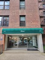 Located in a quiet section of Jackson Heights, this well-maintained two-bedroom co-op offers a practical and comfortable layout. It is a corner unit with windows in each room, providing abundant natural light all throughout. A spacious foyer with a double-door closet leads into a large living room with two oversized windows. The galley kitchen includes ample cabinetry, a gas stove and oven, microwave, and generous counter space.A hallway separates the living area from the bedrooms, offering added privacy. Just outside the bedrooms is another double-door closet for additional storage. The windowed bathroom features a shower/tub combination and accessible toilet.The building is financially sound and professionally managed, with an on-site office and a dedicated five-person staff. The monthly maintenance fee of $1, 175.81 includes electricity, gas, heat, hot water, taxes, and three air conditioning units. Pets under 50 pounds are permitted. While the garage has a waitlist, storage units are available for an additional fee.Residents enjoy access to four landscaped courtyards, gardens, and a private playground. A 25% down payment and board approval are required; subletting is not allowed. Convenient access to the 7 train and Q49, Q66, and Q72 buses, along with nearby shopping and a variety of local dining options, make this an ideal location in one of New York Cityâ€™s most dynamic and diverse neighborhoods.