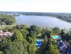 Brand New Waterfront Construction with Existing Boat House and Ramp! To-be-built 4BR, 3.5BA custom colonial on 1.78 private acres with waterfront access, boat ramp, and existing boathouse. Over 3, 000 SF of living space plus full unfinished basement and oversized garage. First floor features open-concept kitchen with walk-through pantry, wine bar, living room with fireplace, study, and den. Upstairs includes a spacious primary suite with WIC&rsquo;s & spa bath. Covered front porch, energy-efficient systems, and in-ground pool. Propane boiler, Central AC, Andersen Windows, premium finishes. Quiet, private location with water views and direct access to Port Jefferson Boating scene. Don&rsquo;t miss the opportunity to build your custom waterfront home, minutes from all that Stony Brook and Setauket have to offer. Base home and specifications to be contracted with award-winning Kelly Builders, recently featured in Long Island Business News best hospitality projects of 2025 for the redevelopment of Seven Beach Lane in Westhampton Beach. Estimated timeline to completion is 1 year from contract.