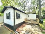 This charming 2-bedroom, 1 bath mobile home is located in a desirable 55+ community offering you the chance to move into a home with fresh updates! Spacious living: Large living room perfect for relaxing and entertaining. Modern updates: Brand new kitchen featuring a dishwasher, electric stove, and a refrigerator. Floors are being updated to add a modern touch. Convenient Amenities: Monthly charges of $1065 a month include: trash removal, clubhouse access, pool tables, land rent, water and sewer maintenance. Outdoor Features: There&rsquo;s an outdoor shed and a small garden area for your enjoyment. Enjoy easy living in a peaceful community with everything you need at your fingertips. Enjoy weekly events! The house is close to main street and parks.