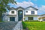New Construction  5 Beds  4 Baths  3, 402 sqft. 53 Elbow Lane, Levittown, NY Luxury Living At 4.9% APR! A Limited Time Builder Rate Buy Down. Enjoy LOWER Monthly Payments, THOUSANDS In Savings & PEACE Of Mind. Ts & Cs Apply.Step into striking sophistication, where bold black-and-white design meets timeless architectural elegance. This fully custom home delivers top-tier craftsmanship, refined finishes, & a seamless flow tailored to the demands of modern luxury living.From its commanding curb appeal to the soaring double columns; the dramatic contrast of white siding & dark trim & stunning front portico with oversized pivot door deliver an unforgettable first impression.Inside, the breathtaking two-story foyer with custom wall detailing, towering ceiling & a sculptural cascading chandelier instantly sets the tone for what lies ahead - light-filled rooms & gallery-worthy designs.Exterior & Curb Appeal* Contemporary white siding with dark architectural accents & sleek metal roof elements* Grand covered front portico opens to oversized pivot door* Professionally landscaped grounds with lush shrubs, manicured lawn, sprinkler system* Paved private driveway leads to a single-car garage with designer exterior accent panelsGrand Foyer & Vertical Drama* Double-height (19 ft.) foyer framed by black-and-white decor & flooded with natural light from oversized picture window * Custom geometric wall paneling, wide staircase with wood treads & black metal balustrade* Black & white coffered ceiling design with 8 ft. cascading ring chandelier * Wide-plank hardwood flooringLiving & Dining: Open Flow Meets Refined Design* Formal living room with electric fireplace & stylish wall detail * Tray-ceiling dining room with designer pendant light & effortless flow to the kitchen* Spacious open-concept layout Chefâ€™s Kitchen: Sleek, Functional, Inspired* Massive waterfall-edge quartz island with seating & prep space* Soft close custom cabinetry with matte black handles* Integrated stainless-steel appliances * Farmhouse sink with backyard views* Sleek mirrored quartz backsplash * Walk-in pantry for discreet, convenient storage* Open-concept layout with view & seamless flow between living, dining & kitchen spacesBedrooms & Baths Designed for Comfort + Versatility* Main-level guest suite with adjacent full bathâ€”ideal for visitors or a private home office* Expansive primary suite upstairs with vaulted ceiling, scenic views & porcelain-tiled walk-in closet* Spa-inspired primary bath with soaking tub, glass-enclosed rain shower, double vanity, chandelier* Three additional spacious upstairs bedrooms with generous closets & large windows* Two more full designer baths featuring high-end tile, sleek vanities & modern lighting* Convenient second-floor laundry room with sink & cabinetry - washer & dryer includedOutdoor Oasis & Smart Living* Large sliding doors lead to a spacious patio & fully fenced backyard, ideal for indoor/outdoor living* Smart-home infrastructure with wiring for integrated lighting, sound system, smart thermostat* Energy-efficient HVAC, insulation, windows & appliances for long-term savings* High-quality construction & finishes designed to minimize maintenance & maximize comfortPrime Levittown Location:* Situated in a quiet, tree-lined street within a sought-after Long Island neighborhood* Close proximity to Levittown schools, parks, playgrounds, recreation & green space* Minutes from shopping, dining & everyday essentials* Easy access to major commuter routes & public transit, for a seamless travel to NYC & beyondWhy Buyers Fall In Love: This is more than a homeâ€”it is a statement of success & refined suburban living. Whether you are hosting loved ones, working remotely or enjoying quiet evenings, this home adapts to your lifestyle while surrounding you in opulence & comfort. Book your private viewing today.