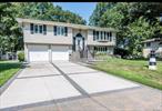 Welcome to 16 Maryanne Ave, Port Jefferson Station!This beautifully renovated high ranch-style home offers the perfect blend of comfort and modern elegance. Featuring 4 spacious bedrooms and 2 full bathrooms, this home is move-in ready and ideal for families or those who love to entertain.Step into the Tradition wood style kitchen, and enjoy the seamless flow into the bright and airy living and dining areasâ€”perfect for hosting or relaxing. Step outside onto the newly built trex large deck with minimal maintenance, ideal for outdoor gatherings or quiet mornings.Recent upgrades includes new heated Roof and Paver driveway and stone veneer, giving peace of mind and boosting curb appeal. Fully owned Solar Panel!The lower level features a versatile open floor plan, an additional bedroom, a full bathroom, and an oversized 2-car garageâ€”perfect for extended family, guests, or a home office setup.Enjoy a generous yard, perfect for outdoor fun and gardening. Located just minutes from the iconic Port Jefferson Marina, you&rsquo;ll be close to charming restaurants, waterfront activities, and everything this vibrant area has to offer.