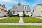 Donâ€™t miss this opportunity to own a spacious, expanded Cape-style home full of character and possibilities. Located in a quiet, established neighborhood, this 4-bedroom, 3-bath home offers over 1, 800 square feet of flexible living space and is ready for your personal touch.The first floor features a traditional Cape layout with a bright living room, hardwood floors, and a large eat-in kitchen with ample cabinet space. Two bedrooms and a full bath complete the main level, offering convenience and potential for a first-floor primary suite or home office. Upstairs, youâ€™ll find two generously sized bedrooms and an additional full bath, providing plenty of space for family or guests. A rear addition expands the homeâ€™s footprint, offering a spacious family room or bonus area that leads to the backyardâ€”perfect for future outdoor entertaining. The full basement and detached garage provide extra storage and utility space. Taxes include Village!