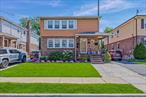 Lovely 2 Family Home, Hewlett/Woodmere School District, 6 bedrooms, New Bathroom, Newly renovated Kitchen with island, extra cabinets, drawers and shelves. Ductless AC unit on first floor, Fully finished basement. Newly Paved backyard with gazebo. Manicured front lawn, ample parking space. Near park, LIRR and shops.