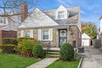 This charming brick Cape-style home in Fresh Meadows, Queens is now on the market! This well-maintained single-family home is flooded with natural light and features 3 roomy bedrooms, 2 full baths, a spacious living room with working fireplace, formal dining room, and an eat-in kitchen. The full basement with a separate side entrance offers great potential for extra space, while the detached 1-car garage and driveway provide added convenience. Located in an area close to schools, parks, shopping, and public transportation, this home is ready for you to make it your own. Don&rsquo;t miss out on this wonderful opportunity!