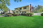 Welcome to this spacious and elegant Colonial-style in the coveted Triangle section of Melville. Boasting 5 generously sized bedrooms and 2.5 updated bathrooms, this home offers the perfect blend of comfort, style, and convenience.Step inside to find gleaming hardwood floors, central air, and modern recessed lighting throughout. The main level features a bedroom (garage conversion), formal living room, formal dining room, and a large family room with sliders leading to the private backyard ideal for indoor-outdoor entertaining.The beautifully updated kitchen is a chef&rsquo;s dream, complete with ample cabinetry, premium finishes, and good appliances. The home also features a partially finished basement perfect for a home office, gym, playroom and storage.Located just minutes from the LIRR, shopping, schools, and major highways, and zoned for top-rated South Huntington schools, this home has it all.