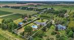 Idyllic vineyard views, feel like you&rsquo;re on vacation all year! Wake each morning to a masterpiece, as the sun rises over 200 acres of vines just beyond your backyard! Down a private lane in the coveted hamlet of Jamesport, this beautiful ranch is your private retreat set on 1.25 manicured acres, where every day feels like a getaway. The light filled living room features a cathedral ceiling with skylights. Granite and stainless kitchen and dining rooms lead to sunny deck overlooking your sparkling saltwater pool. 3 bedrooms, 2 baths, main floor laundry, spacious 2 car garage and a full basement complete this comfortable home, meant for entertaining inside and out. Enjoy spending cool evenings under the stars by the glow of your firepit, or move the party inside to the comfort of central air, natural gas heat, and a beautiful fireplace in the living room. There is also a full basement and whole house generator. This is a home where wine country charm meets the beauty of the North Fork every day!
