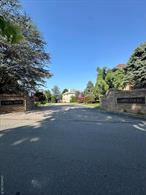 11, 550 square feet vacant land. R1-1 Zoning. Private Street with Easement to its surrounding homeowners&rsquo; to access their driveways and garages. 50+ possible parking spaces available, or consult with an architect for other options. Sold As Is.