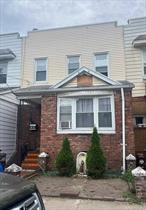 Lovely 2 Family in Ozone Park conveniently located near schools, shops, houses of worship, buses & A train. This home features 4 bedrooms, 2 baths & full finished basement. Backyard community driveway for parking in back.