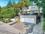 Nestled on a serene, tree-lined cul-de-sac in the sought-after Lawrence Park West neighborhood of Bronxville, this stunning 4-bedroom, 3-bathroom contemporary residence offers the perfect blend of comfort, elegance, and modern convenience. Step inside to discover a sun-drenched interior featuring a spacious living room with a cozy fireplace, perfect for relaxing or entertaining. The heart of the home is a newly renovated custom gourmet kitchen, beautifully appointed with ceramic tile finishes, glass backsplash, and premium appliancesâ€”ideal for any culinary enthusiast. The main level boasts a wonderful open floor plan, including a gracious primary bedroom with its own private powder room, two additional generously sized bedrooms, and a tastefully updated hall bathroom. Downstairs, the lower level offers an additional 500 square feet of versatile living space, including a fourth bedroom, full bathroom, and a large family room or home office with a separate entranceâ€”perfect for extended family, guests, or a private workspace. Outdoors, youâ€™ll find true pride of ownership in the meticulously landscaped yard, complete with manicured lawns, shrubs, and a multi-tiered backyard oasis plus a lovely patio area and a spacious deck above the 2 Car Garage. New stone walkways and retaining walls add character and charm, while the private outdoor space is ideal for summer entertaining and quiet evenings under the stars. Recent upgrades include New custom kitchen, Vinyl fencing, light fixtures enhanced landscaping, Attic insulation, electrical upgrades and Ductless central air system Located just a short walk to Bronxville Village, this home is a commuterâ€™s dreamâ€”minutes to Metro-North, buses, shopping, parks, and only 25 minutes to Manhattan. Driveway parking. This is suburban living at its finest, where tranquility meets convenience in one of Westchesterâ€™s most desirable neighborhoods. Donâ€™t miss the opportunity to call this exquisite property your next home.