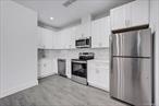 NEW CONSTRUCTION....Be the FIRST to Experience Contemporary Living in this BRAND NEW 2-BEDROOM/1-BATH RENTAL Apartment that offers both Convenience and Luxury in an Exceptional Location near Shops, Restaurants, and the Train Station. This Spacious Corner Apartment (975 SF) Boasts a Well-Appointed Chefâ€™s Kitchen Featuring White Cabinetry, Quartz Countertops, Stainless-Steel Appliances and Open-Concept Dining and Living areas, Enhanced by Large Windows. Each bedroom includes a Walk-In Closet; the Primary Bedroom also features French doors to Spacious Balcony (4&rsquo; x 26&rsquo;). Additional Amenities to Include an In Unit Washer & Dryer, Central Air Conditioning, Wood Floors, and Recessed Lighting Throughout. Train Service to Grand Central Station takes about 35 minutes. The monthly rent includes Hot and Cold Water, as Well as One Designated Outdoor Parking Space. Pets and Smoking are not allowed. Residents may also qualify for discounted membership at Lake Isle Country Club, offering golf, tennis, and multiple swimming pools. FLOOR PLAN INCLUDED IN PHOTOS. BUILDING HAS AN ELEVATOR