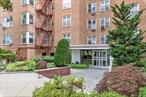 **Stunning Top-Floor 2-Bedroom Apartment in The Plymouth â€“ Bay Terrace** Welcome to this beautifully renovated top-floor 2-bedroom, 1-bathroom apartment at The Plymouth in Bay Terrace. This sun-drenched apartment offers a lovely bridge view and a spacious layout. *All utilities included in monthly maintenance!*Step into an inviting entry foyer leading to a large living room and a separate dining areaâ€”easily convertible into a third bedroom or office space. The eat-in kitchen has been completely renovated, featuring custom cabinetry, gleaming granite countertops, breakfast bar and stainless steel appliances. There is an abundance of closet space including a large walk-in closet in the foyer.Both bedrooms are generously sized, offering ample closet space, while the updated bathroom adds a touch of modern decor. As a rare bonus, this apartment includes its own **large, private storage locker** for ultimate convenience. The Plymouth offers an assigned outdoor parking spot ($40/month), a convenient lobby-level laundry room, and maintenance that **includes all utilities**. Ideally located just minutes from Bay Terrace Shopping Center, express buses to NYC, local buses to Main Street, and Bell Boulevardâ€™s vibrant dining, shopping, and LIRR access. Donâ€™t miss this incredible opportunityâ€”schedule your viewing today!