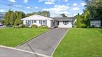 Welcome To 1 Debbie Lane In Patchogue! This Beautifully Situated 4 Bedroom , 1 Bath Ranch Offers Open Living Space, Tons Of Natural Light Through-Out w/ Eat-In-Kitchen. Stepping Into The Back Yard You Are Surrounded by Lush Privacy Trees, Truly Perfect For All Of Your entertaining Needs.