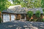This beautiful shingle-style home abutting 2 acres of town-owned reserve offers the perfect blend of Hamptons privacy, charm and comfort. Set back over 315 feet+/- from the road on .75 acres, the property provides ample room to add a pool and create your own outdoor Hamptons tranquil oasis. Featuring 4 bedrooms, 2 full bathrooms, and 1 half bath, the thoughtful layout is ideal for both everyday living and entertaining. The heart of the home is a spacious double-height living room with a cozy gas fireplace which can be easily converted back to wood-burning, seamlessly connected to the dining area and flowing effortlessly to the backyard. The well-appointed kitchen, convenient laundry room, and attached 2-car garage add to the home&rsquo;s functionality. On the first level, a private primary en-suite boasts a large walk-in closet, and room to install sliding doors for backyard and deck access. There is also an additional bonus room which functions perfectly as a home office or study with garden views. Upstairs there are three versatile rooms that may function as guestrooms, home offices, or creative studio spaces. The current home spans 1, 995 SF+/-, with the possibility to expand to meet your needs. An unfinished full basement also awaits your vision - perfect for a media room, gym, wine cellar, or additional living space. In a highly sought after location just minutes from Westhampton Village, Eastport Village, renowned Hamptons beaches, and acclaimed restaurants. For tennis and pickleball enthusiasts, enjoy Tennis at the Barn just moments away. A rare opportunity to purchase at this price point in this location. Whether as a year-round residence or a weekend escape, this Hamptons haven offers timeless style, a prime location, and the flexibility to create the lifestyle you&rsquo;ve always imagined.