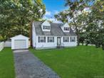 Charming Four-Bedroom Cape with Modern Amenities Welcome to your dream home! This delightful four-bedroom, two-bathroom Cape Cod-style residence perfectly balances classic charm with contemporary comforts. Nestled in a serene neighborhood, this home offers an inviting ambiance and a versatile floor plan ideal for family living and entertaining. As you step inside, you&rsquo;re greeted by a bright and airy Dinning room and large windows that flood the space with natural light. The first floor features two spacious bedrooms and a full bathroom, offering flexibility for guests or a home office. Upstairs, you&rsquo;ll find two additional generously-sized bedrooms with plenty of closet space, along with a second bathroom. The basement has endless possibilities. Step outside to a beautifully landscaped yard with ideal for summer barbecues and outdoor gatherings. The driveway provides ample parking. Conveniently located near All, shopping, dining, Beach, Parks and major highways, this home is perfect for those seeking a blend of comfort, style, and convenience. Don&rsquo;t miss the opportunity to make this charming Cape your own!