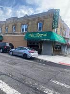 2 family and store, Restaurant and bar, turn-key business. 2-2-bedroom apartment, second floor. Corner property in busy Liberty Ave, close to the highway and JFK Airport. Minutes away from Resort World Casino. Well-established business for over 21 years. Well kept building , just move in and start working the cash register. Basement full and finished with built in freezer and ample storage area for beer, soda, liquor, wine and all stocks. Custom made stairway from first floor to basement. Nice corner property with great potential for other businesses ( Dunkin Donut, Pizzeria, Dentistry, Law office, Medical office, Flower shop etc. Easy to show from 6.00 pm to 8.00 pm daily. Two apartment on the second floor, both are two bedroom each ($3600.00 income) no lease. Main floor has a fully equip kitchen, fully stocked bar with pool table and juke box. For additional details just call Mike.