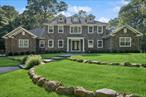 Set On 3.5 Private Acres In The Prestigious Village Of Head Of The Harbor, 33 Bacon Road Is A Masterpiece Of Design, Craftmanship And Luxury. Built In 2012, This 4900 Square Foot Georgian Colonial Combines Timeless Architectural Elegance With Modern Conveniences, Offering An Unmatched Lifestyle In One Of Long Island&rsquo;s Most Sought-After Enclaves. The Approach To The Property Is Framed By Lush, Manicured Landscaping, A Stately Stone Facade, And Paver Walkways That Set The Tone For The Refinement Inside. Stepping Through The Grand Front Door, You Are Greeted By A Two-Story Marble-Floored Foyer Crowned With A Sweeping Staircase, A Dramatic And Elegant Introduction To The Home. The Main Level Is Designed For Both Lavish Entertaining And Intimate Gatherings. The Formal Living And Dining Rooms Are Enhanced With Custom Moldings, Coffered Ceilings, And Rich Hardwood Floors. The Gourmet Chef&rsquo;s Kitchen Is The Heart Of The Home, Featuring Granite Countertops, Bespoke Cabinetry, Stainless Steel Appliances, A Spacious Center Island, And An Adjoining Breakfast Area. This Open Space Flows Seamlessly Into The Family Room, Where Soaring Ceilings, A Wall Of Windows, And A Gas Fireplace Create A Warm Yet Impressive Gathering Space. A Luxurious First Floor Primary Suite Offers The Ultimate Retreat With A Spa-Like Bathroom With Jacuzzi Tub, Oversized Glass Shower, Dual Vanities, Granite Counters, A Large Walk-In Closet And Direct Access To The Backyard Via French Doors - Perfect For Morning Coffee Or An Evening Swim. There Are Four Additional Bedrooms In The Home, As Well As A Spacious Bonus Room Upstairs. This Residence Is As Functional As It Is Beautiful Boasting Additional Amenities Including Central Air, Central Vacuum, Full House Generator, As Well As An Unfinished Basement With Exterior Access - Ready For Customization. A Three-Car Garage Offers Ample Space For Vehicles And Storage. A Separate Carriage House Expands The Property&rsquo;s Versatility, Serving As A Fully Equipped Guest Residence Or Entertainment Retreat. Complete With Its Own Kitchen, Bar, Living Area, Bedroom, And Full Bathroom, It Offers A Private Haven For Visitors Or Extended Family. Outdoors, The Property Transforms Into A Private Resort With An Expansive Paver Patio Surrounding The Sparkling Salt-Water And Heated Pool, While The Mature Trees And Plantings Provide Beauty And Privacy Year-Round. The Setting Offers The Tranquility Of A Country Estate, Yet Is Only Minutes From Long Island Sound Beaches, Avalon Nature Preserve, Quaint Stony Brook Village, Local Vineyards, And Is Just 60 Miles From Manhattan! 33 Bacon Road Is More Than A Home, It&rsquo;s A Lifestyle! With Its Blend Of Stately Architecture, Modern Amenities, And An Unbeatable Location, It Represents One Of Head Of The Harbor&rsquo;s Finest Offerings.