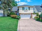 On the market for the first time in 40 years, this beautiful split-level home is situated on a lush park-like property in Bayside, one of Queensâ€™ most sought-after neighborhoods. Enter on the first floor to a large living room and formal dining room with hardwood floors, sliding doors to the backyard, and kitchen with stainless steel appliances. Upstairs features a primary bedroom with full bathroom including stand-up shower, an additional two bedrooms and a second full bathroom with tub. Downstairs features a ground level den with full bathroom, side entrance and access to an attached 1.5 car garage. Down a few more steps is the basement with laundry, utilities and an abundance of storage space. Enjoy the best of suburban living with the convenience of being close to all - the Bayside LIRR station, multiple bus lines, Bell Blvd, Northern Blvd, Crocheron park, restaurants, cafÃ©s, and an abundance of shopping options. Queens District 26 schools.